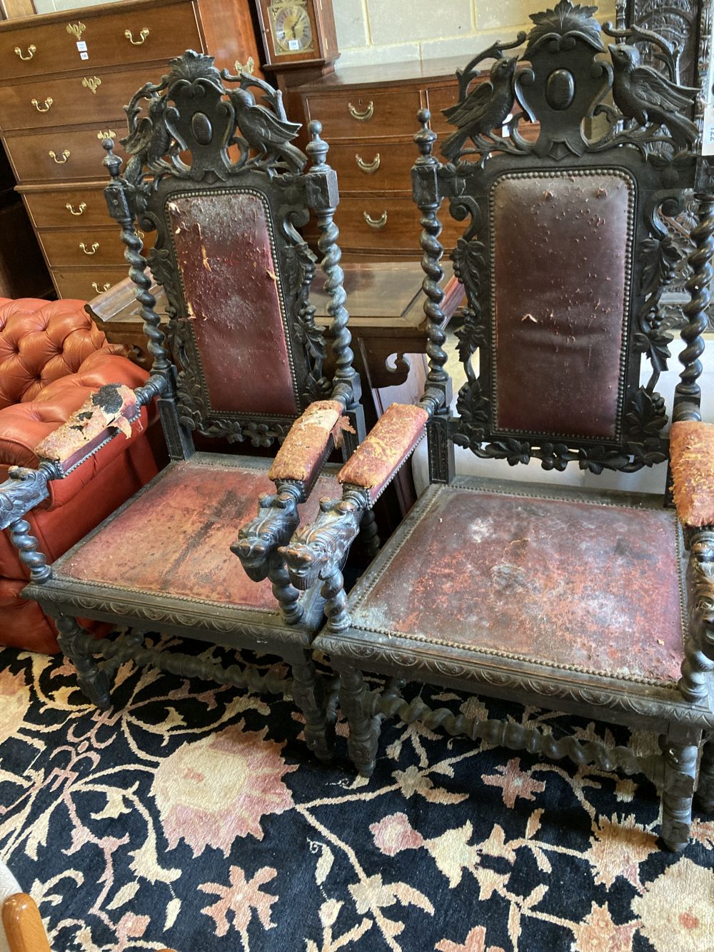 A set of six 19th century Flemish carved oak dining chairs,